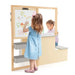 Children's art desk with drawing materials and storage shelves on a white background with kids drawing