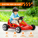Child riding a red electric ride-on kart with product details on a blurred outdoor background