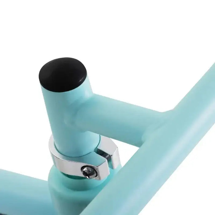 Close-up of blue metal frame with adjustable clamp on no-pedal balance bike.