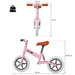 Pink no-pedal balance bike with adjustable seat, lightweight frame, and size measurements