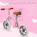 Pink no-pedal balance bike with adjustable seat height for kids, lightweight metal frame