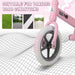 Pink no-pedal balance bike with white tire and adjustable seat, suitable for various road conditions