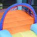 Colorful inflatable bouncy castle interior with orange floor and mesh safety walls