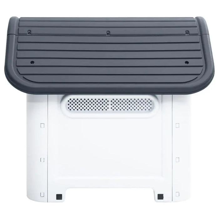 Grey and white outdoor dog house with ventilation and raised floor, front view