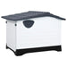 Grey, white, and black outdoor dog house with raised floor and side ventilation panel