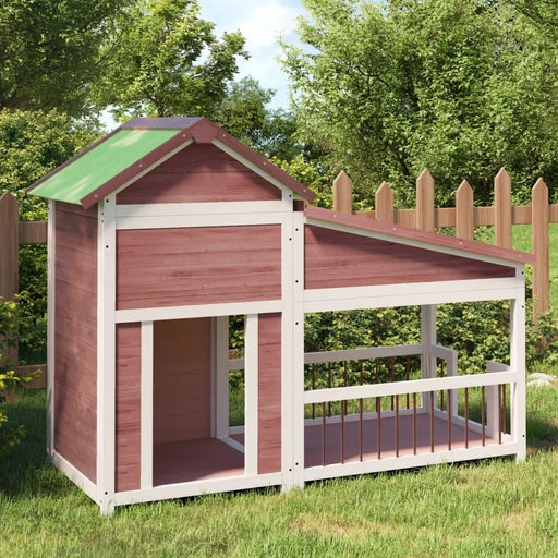 Outdoor wooden dog kennel with large entrance and fenced porch in grassy backyard