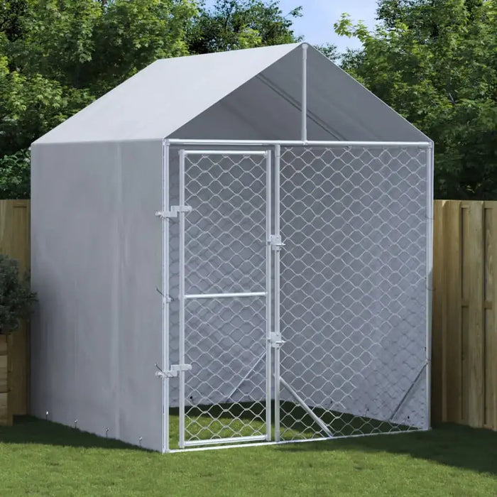 Outdoor dog kennel with roof and sidewalls, silver galvanized steel, on grass yard