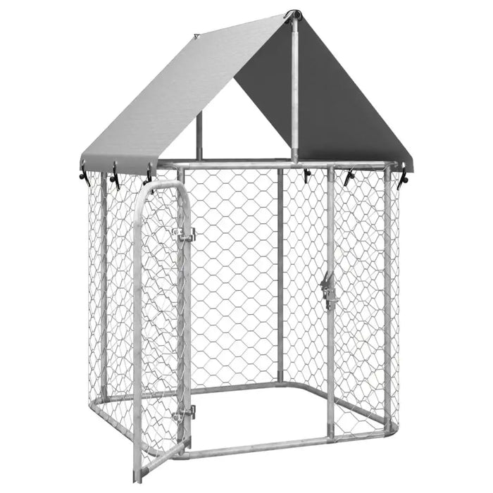 Outdoor galvanized steel dog kennel with mesh panels and sloped roof, secure pet enclosure