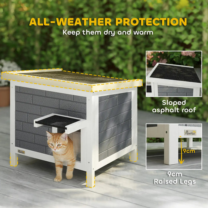 Cat house with all-weather protection features on a wooden deck.