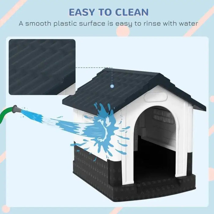 Outdoor plastic dog kennel with slanted roof rinsed by hose, easy to clean surface shown.