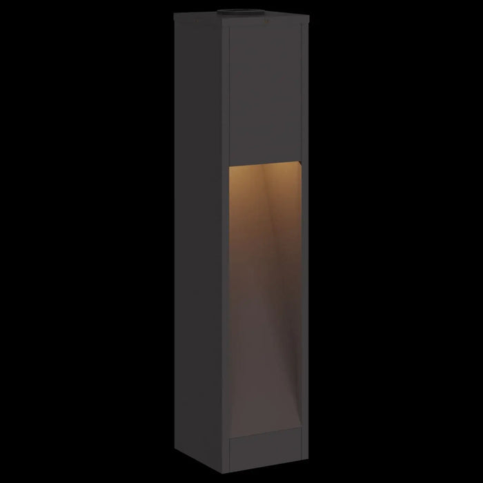 Modern black outdoor solar LED pathway light with warm illumination in sleek rectangular design