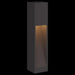 Modern black outdoor solar LED pathway light with warm illumination in sleek rectangular design