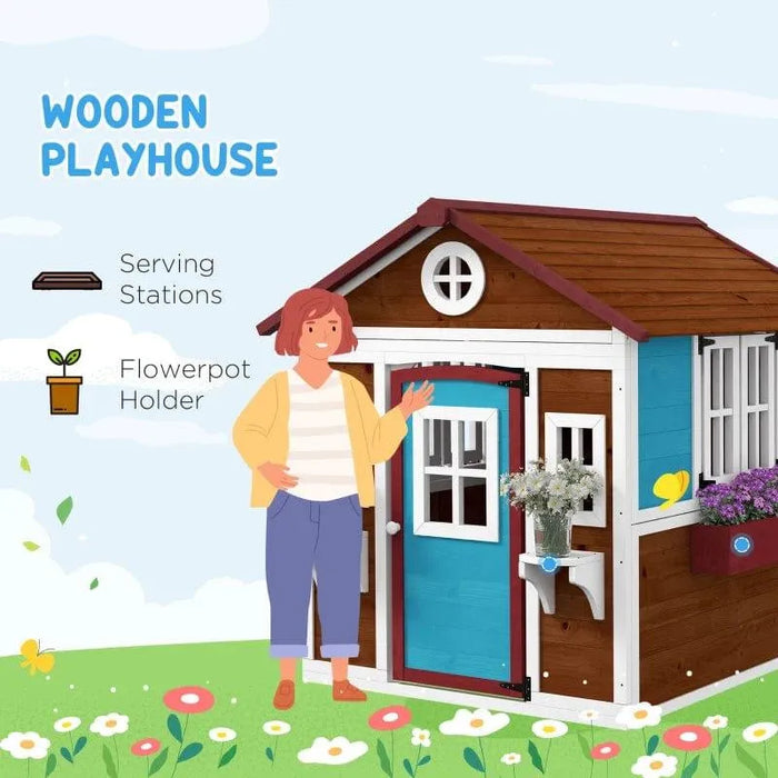 Colorful wooden garden playhouse with planter boxes and serving stations outdoors