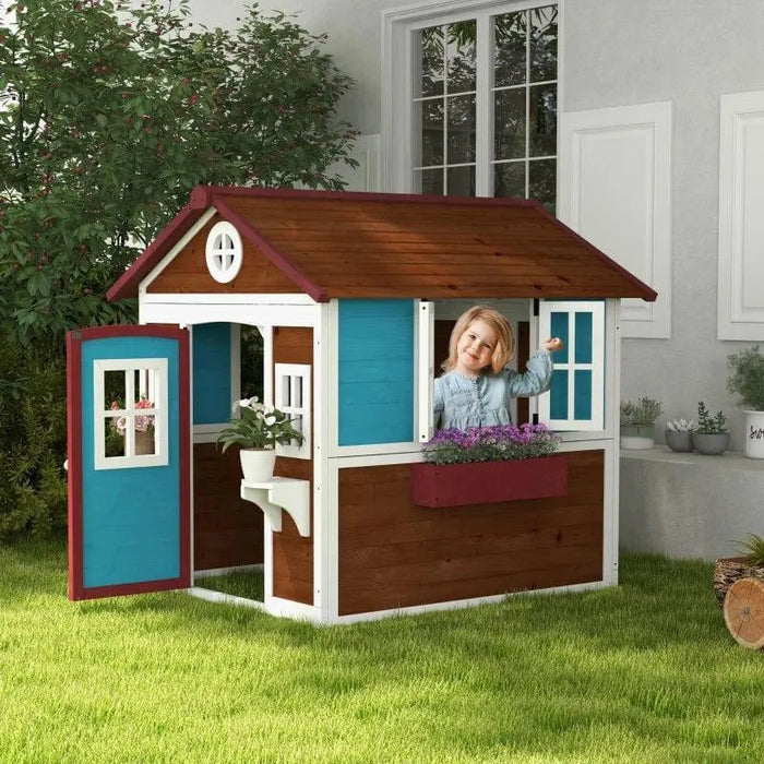 Outdoor wooden garden playhouse with blue panels, flower box, and child playing inside