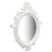 Decorative white mirror with intricate floral patterns on a white background