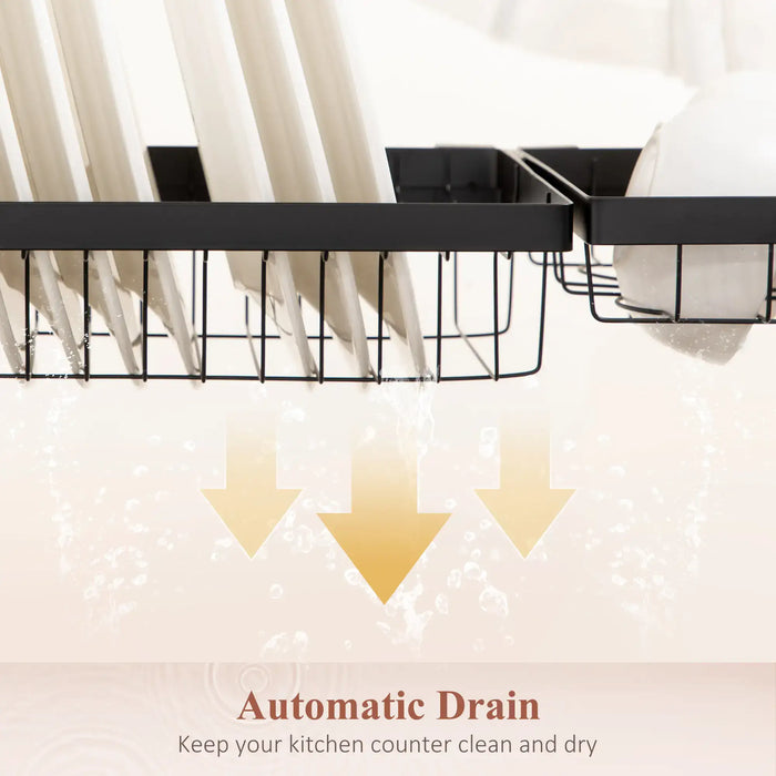 Black dish rack with automatic drain feature on a white background