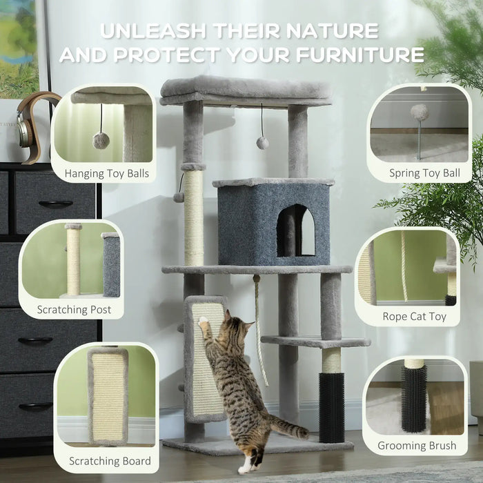 Gray multi-level cat tree with scratching post, hanging toy balls, spring toy, rope cat toy, grooming brush, and a cat scratching