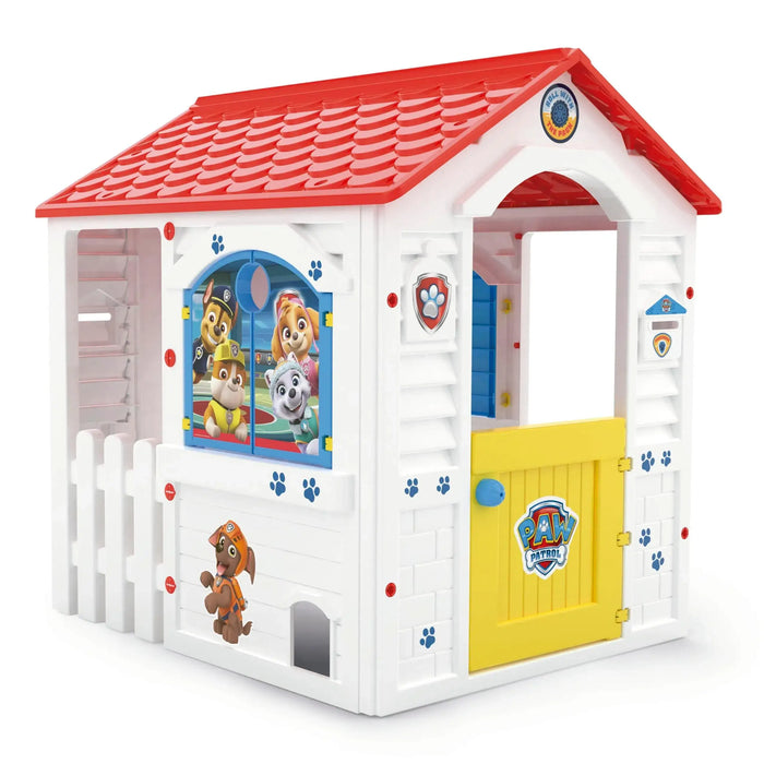 PAW Patrol Adventure Bay playhouse with cartoon pups, white walls, red roof, and yellow door