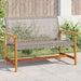 Grey PE rattan outdoor garden bench with wooden armrests on stone patio surrounded by greenery