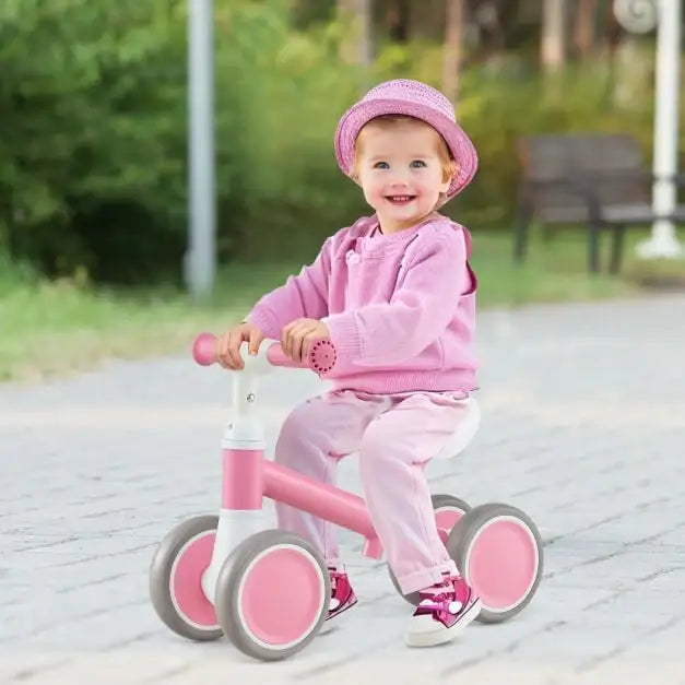 Pink Toddler Balance Bike – 4-Wheel Stability | Adjustable Seat and Handlebar COSTWAY - Little and Giant Explorers Costway