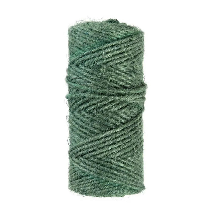 Green garden jute twine roll for plant tying, pruning, and gardening tasks
