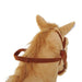 Plush ride-on horse toy with brown mane and bridle, interactive children's gift