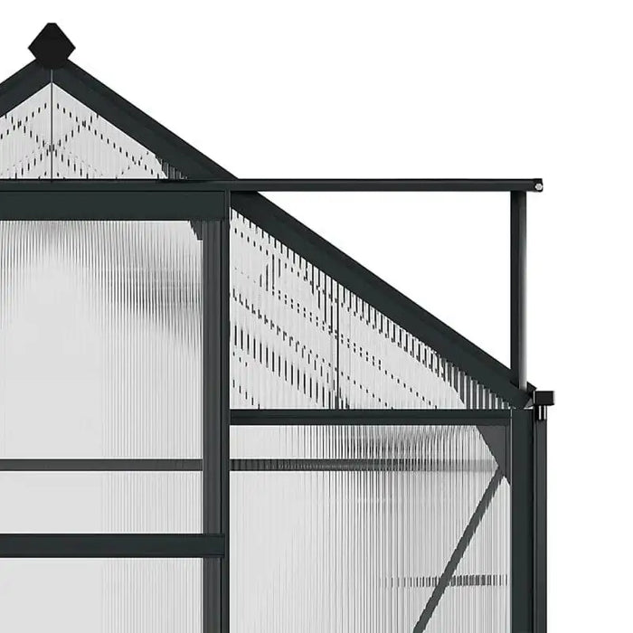 Polycarbonate greenhouse with grey aluminum frame and transparent panels