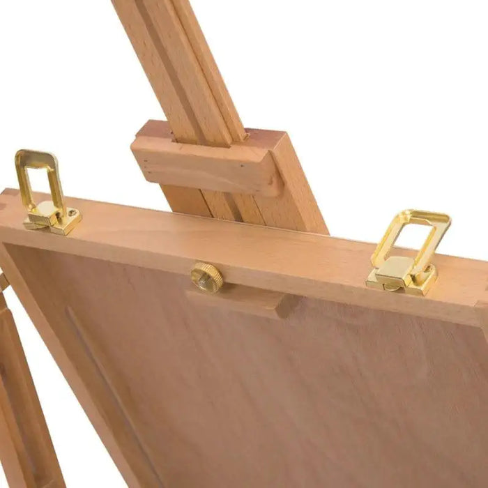 Close-up of adjustable beech wood folding easel with brass hardware on white background.