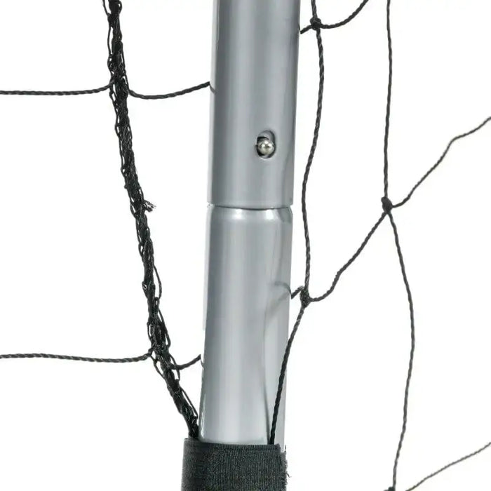 Close-up of metal frame and black net on portable football goal