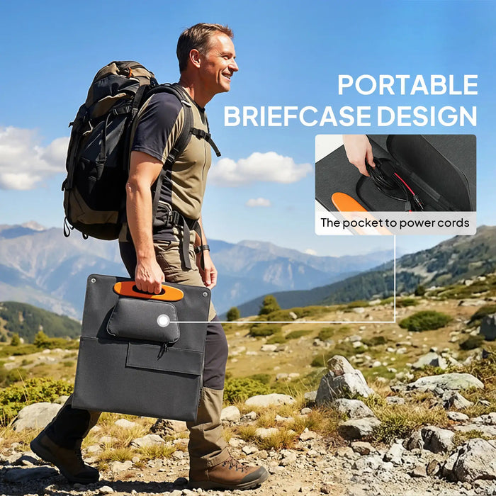 Hiker carrying portable solar panel with briefcase design and power cord pocket in mountainous landscape