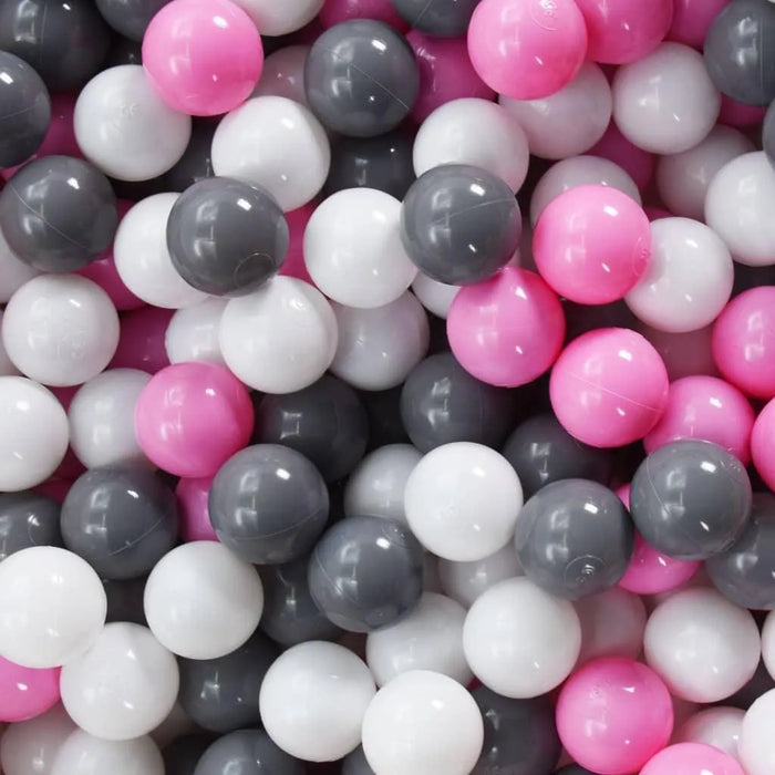 Pink, white, and grey soft play balls for princess-themed play tent or ball pit.