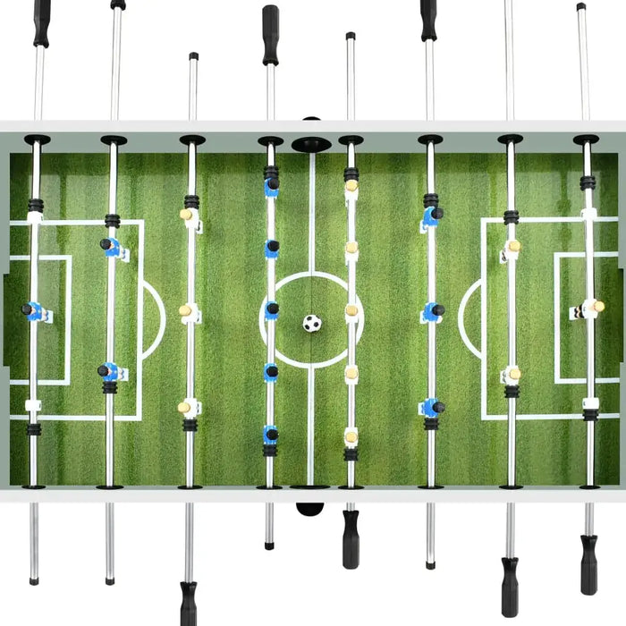 Top view of white pro football table with green pitch, foosball players, and adjustable rods