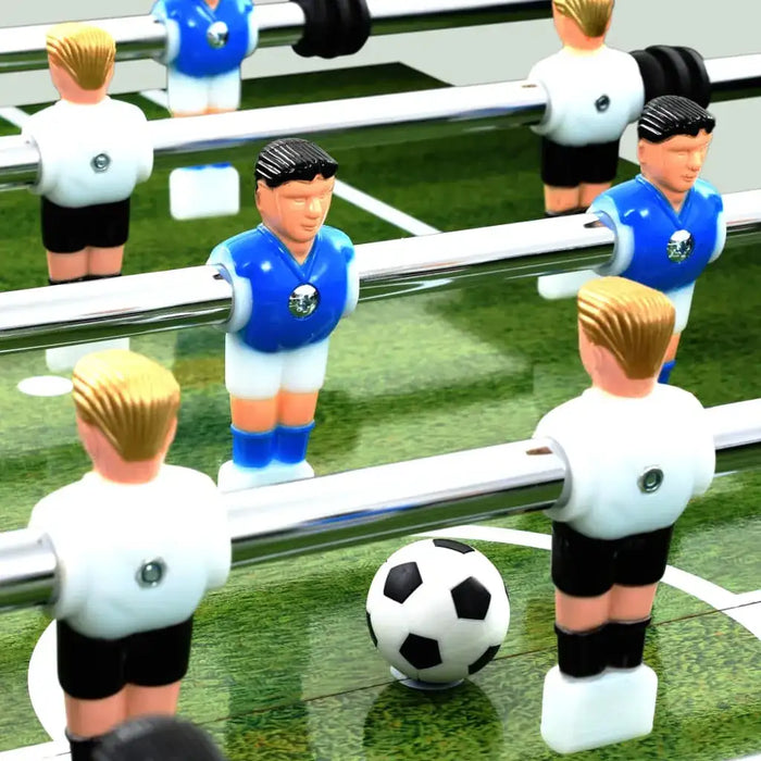 Close-up of professional foosball table with white and blue players on green field