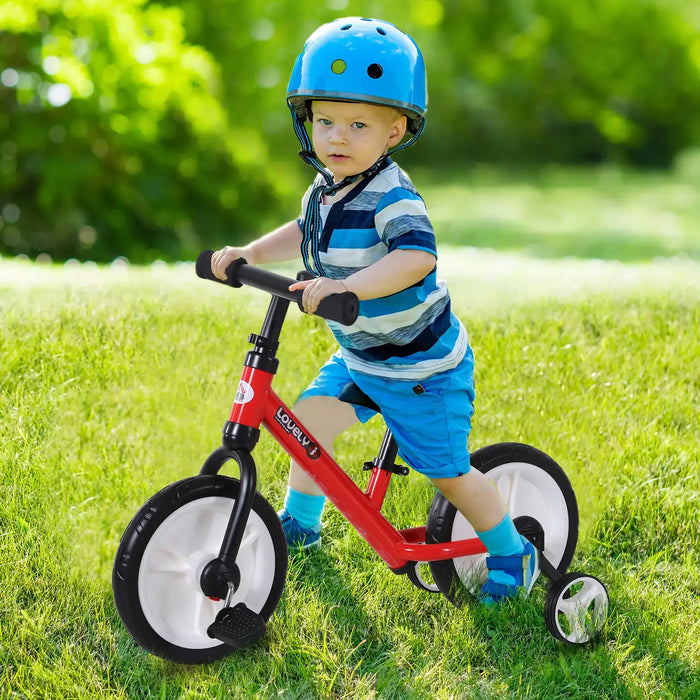 Toddler boy wearing blue helmet and striped shirt riding red balance bike on green grass
