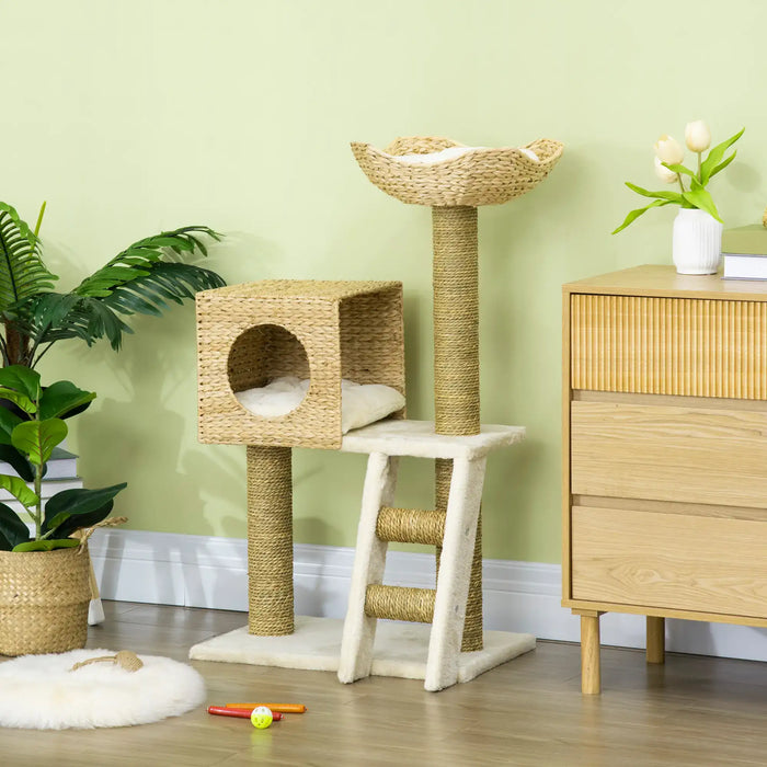 Natural woven cat tree with sisal scratching posts, cozy pads, ladder, and perch in modern living room