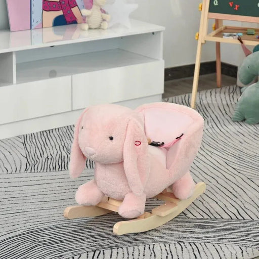 Pink plush rabbit rocking horse with wooden rockers in a children's playroom
