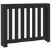 Black radiator cover with vertical slats on a white background