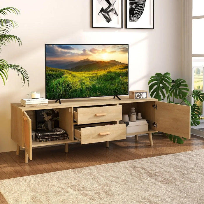 Natural wood media unit with drawers, cabinets, 65-inch TV, and decorative items in bright living room