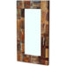 Rectangular mirror with a wooden frame made of various wood pieces on a white background