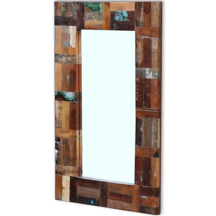 Rectangular mirror with a wooden frame made of various wood pieces on a white background