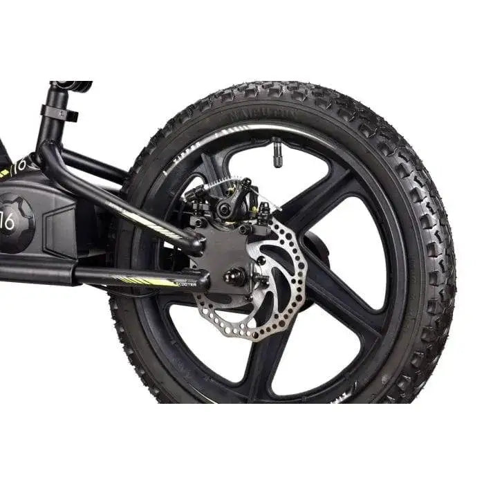 Close-up of 16-inch rear wheel and disc brake on kids' electric balance bike