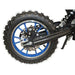 Close-up of blue mini dirt bike rear wheel with knobby tire and disc brake