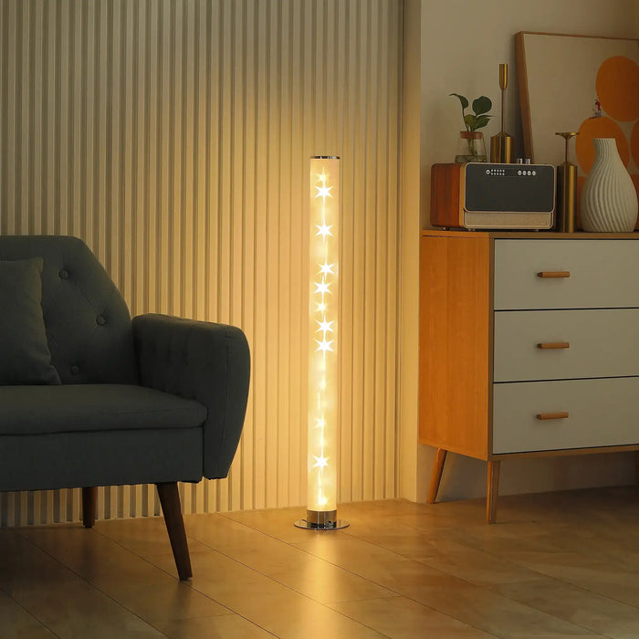 Modern LED floor lamp with star lights beside sofa in cozy living room setting