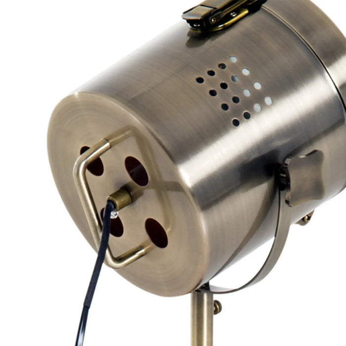 Metallic lamp with a stand on a white background