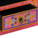 Close-up of a retro wooden TV cabinet drawer with pink and mango wood finish and hand-painted colorful floral design