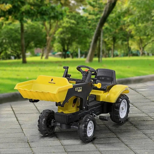 Yellow ride-on excavator toy with metal frame and steering wheel on paved outdoor path