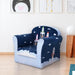 Multicolour kids armchair with fun rocket design, toddler chair in a bright playroom setting