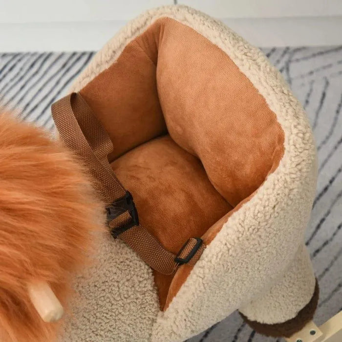 Close-up of brown plush lion rocking horse seat with safety harness and soft cushion