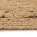 Close-up of a woven jute mat on a white background