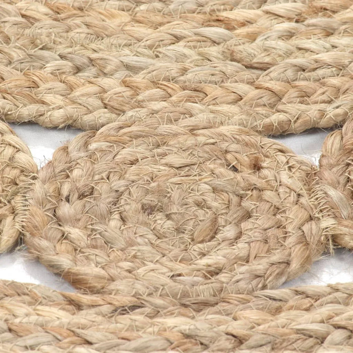 Close-up of braided natural fiber rope on a white background